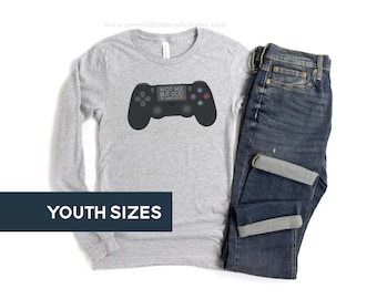Youth St Carlo Acutis Tshirt Video Game Controller Catholic Long Sleeve Shirt Not Me But God St Carlo Acutis Catholic Gamer Catholic Kid Tee