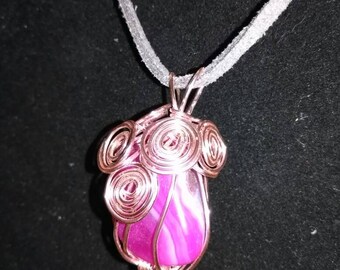 Wire wrapped pink stone
