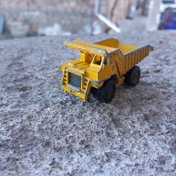 Hot Wheels CAT DUMP TRUCK Yellow Caterpillar Etsy