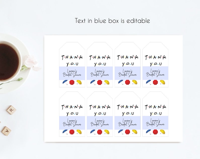 May include: Eight white gift tags with the text "THANK YOU" in colorful letters, a blue and white striped background, and the words "Lauren's Bridal Shower" in black script. The tags feature a red, yellow, and blue umbrella design.