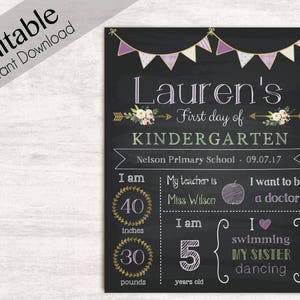 May include: A chalkboard sign with a purple and gold floral design. The sign says "Lauren's First Day of Kindergarten" and includes details like height and weight. The sign is perfect for a first day of school photo.