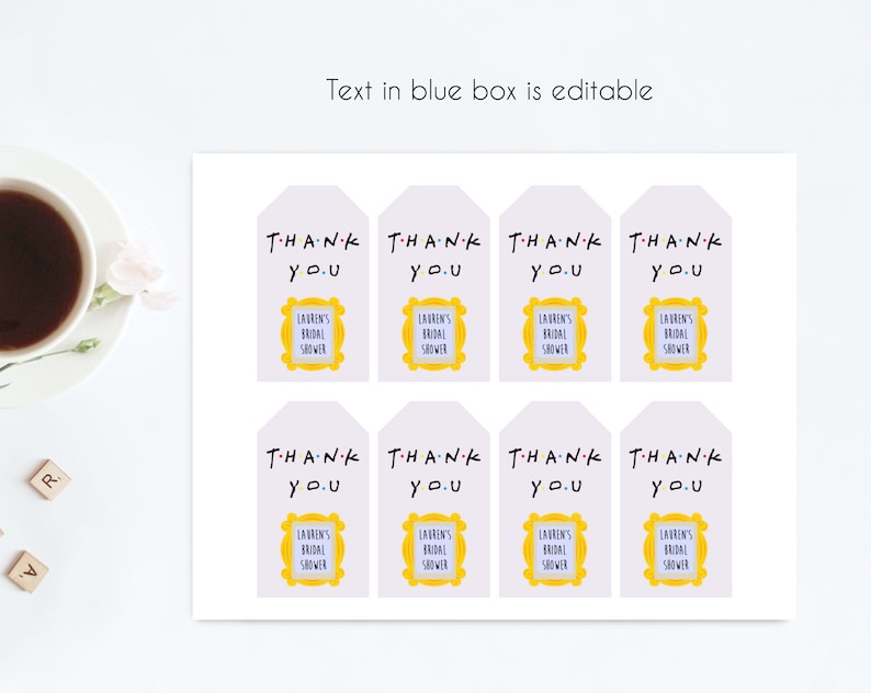 May include: Eight white favor tags with the text "THANK YOU" in black and a yellow frame with the text "LAUREN'S BRIDAL SHOWER" in purple.
