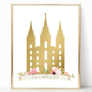 May include: A gold silhouette of a temple with a white background and pink flowers at the bottom. The text "I am a child of God" is written on a white banner.