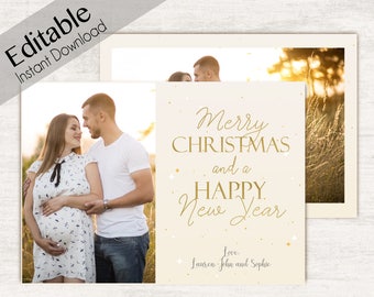 May include: A Christmas card with a photo of a couple in a field. The card has a gold glitter background and the text "Merry Christmas and a Happy New Year" in gold script. The text "Love, Lauren, John and Sophie" is also included in gold script.