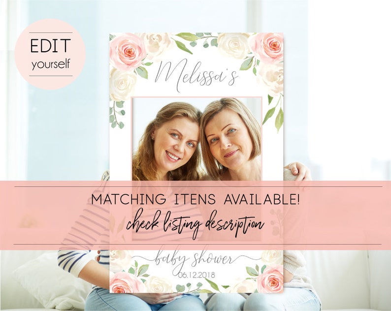 May include: A pink and white floral photo booth frame with the text "Melissa's Baby Shower 06.12.2018" and a photo of two women.