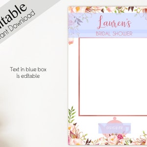 May include: A printable bridal shower photo booth prop with a floral design and a rose gold frame. The text "Lauren's Bridal Shower" is at the top of the frame. The text in the blue box is editable.