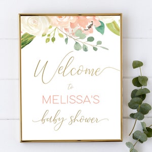 Puede incluir: Un cartel blanco con marco dorado y dise&ntilde;o floral. El cartel dice "Bienvenido al baby shower de Melissa".