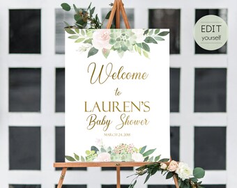 May include: A white welcome sign with green and pink floral accents. The sign reads "Welcome to Lauren's Baby Shower March 24, 2018".
