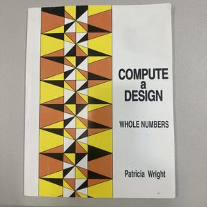 May include: A vintage book titled "Compute a Design" with the subtitle "Whole Numbers" by Patricia Wright. The cover features a geometric pattern in yellow, orange, black, and white.
