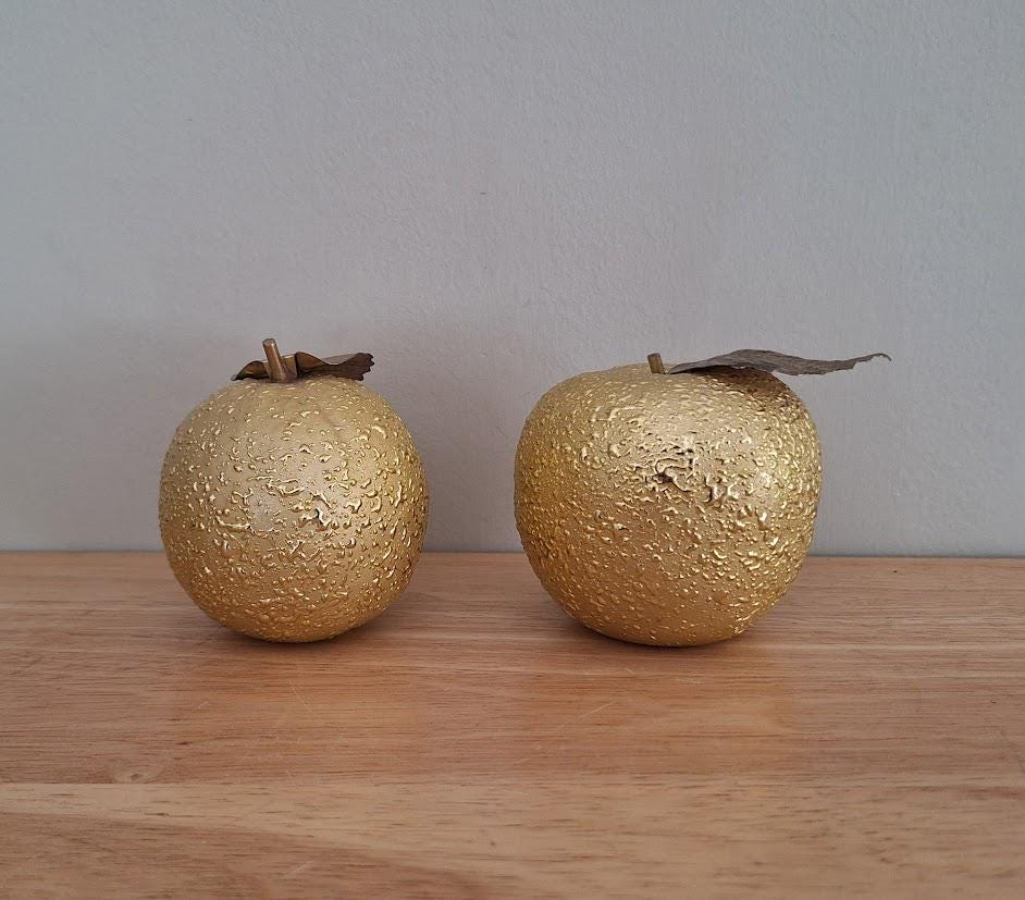 Pair of Decorative Gold Apples With Textured Finish and Metal Leaf