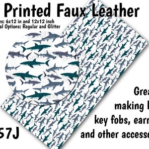 May include: Printed faux leather sheet with a repeating pattern of blue and gray sharks on a white background. The sheet is available in two sizes: 6x12 inches and 12x12 inches. The text "C57J" is printed in the lower left corner of the sheet.