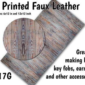 May include: Printed faux leather sheet with a wood grain pattern in shades of brown, gray, and white. The sheet is available in two sizes: 6x12 inches and 12x12 inches. The text "Z17G" is printed in the lower left corner. The text "Printed Faux Leather" is printed in the upper left corner. The text "Sizes: 6x12 in and 12x12 inch" is printed below the title. The text "Great for making bows, key fobs, earrings, and other accessories!" is printed in the lower right corner.