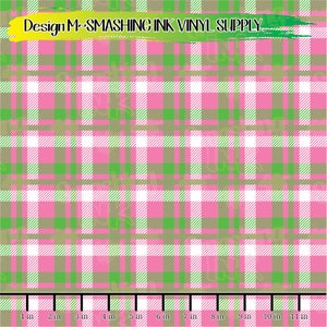 May include: A pink, green, and white plaid pattern with a ruler showing 11 inches. The text "Design M-SMASHING INK VINYL SUPPLY" is at the top of the image.