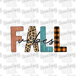 May include: Fall vibes text graphic with a brown, leopard print, blue, and black and orange plaid design.