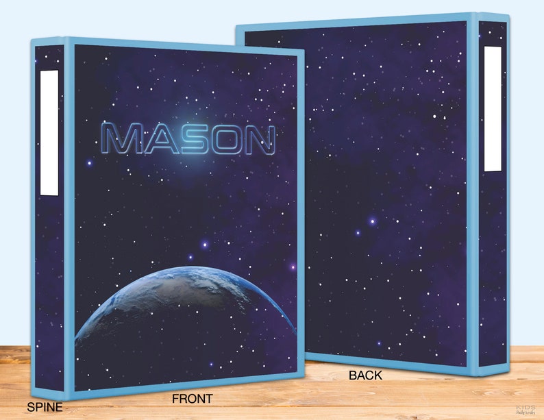 May include: A personalized binder with a space theme. The front features the name "MASON" in a glowing blue font against a backdrop of a planet and starry night sky. The binder has a light blue border and a white spine label.
