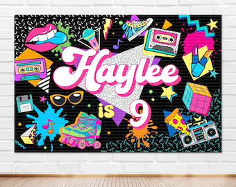 May include: A colorful 90s themed birthday party backdrop with the name Haylee and the number 9. The backdrop features a black background with bright colors, geometric shapes, and 90s icons like cassette tapes, roller skates, and a Rubik's cube.