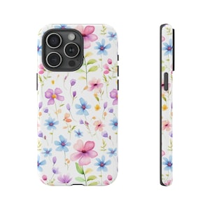 May include: A white phone case with a floral pattern. The flowers are pink, blue, and purple. The case has a black border.