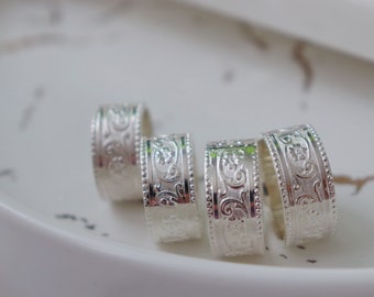 Heavy-wall flower patterned silver rings