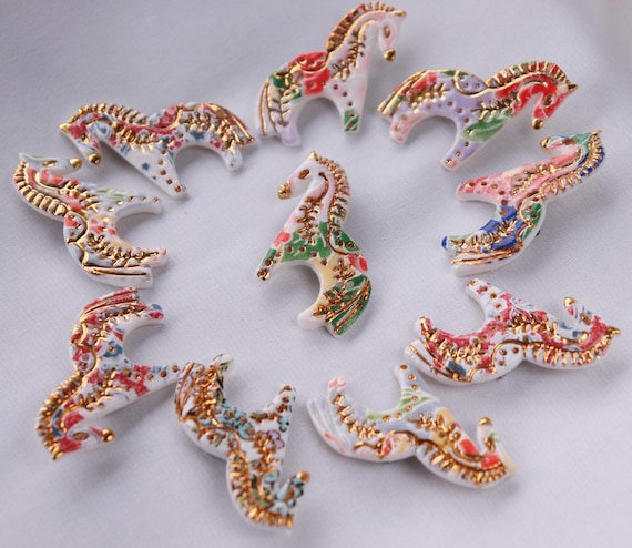 Porcelain horse brooch