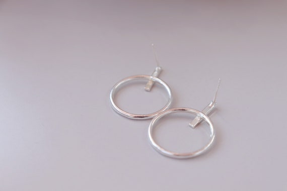 Minimalist  unicycle sterling silver earrings