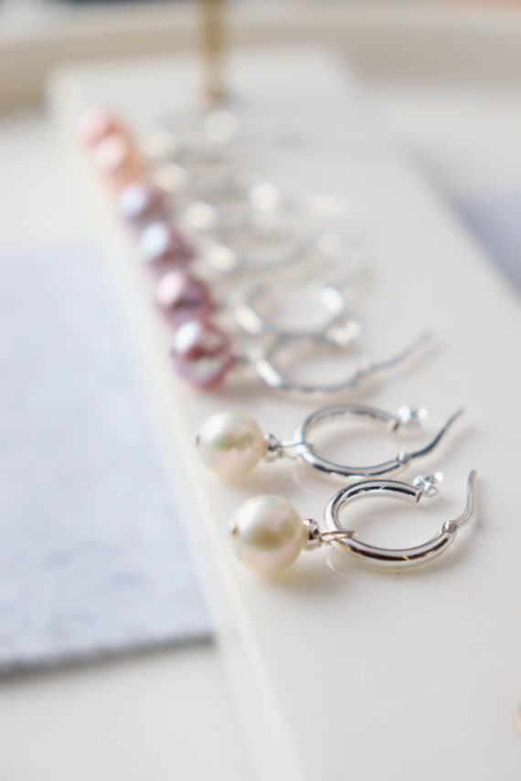 Hinged hoops or sleeper hoops attached with freshwater pearls