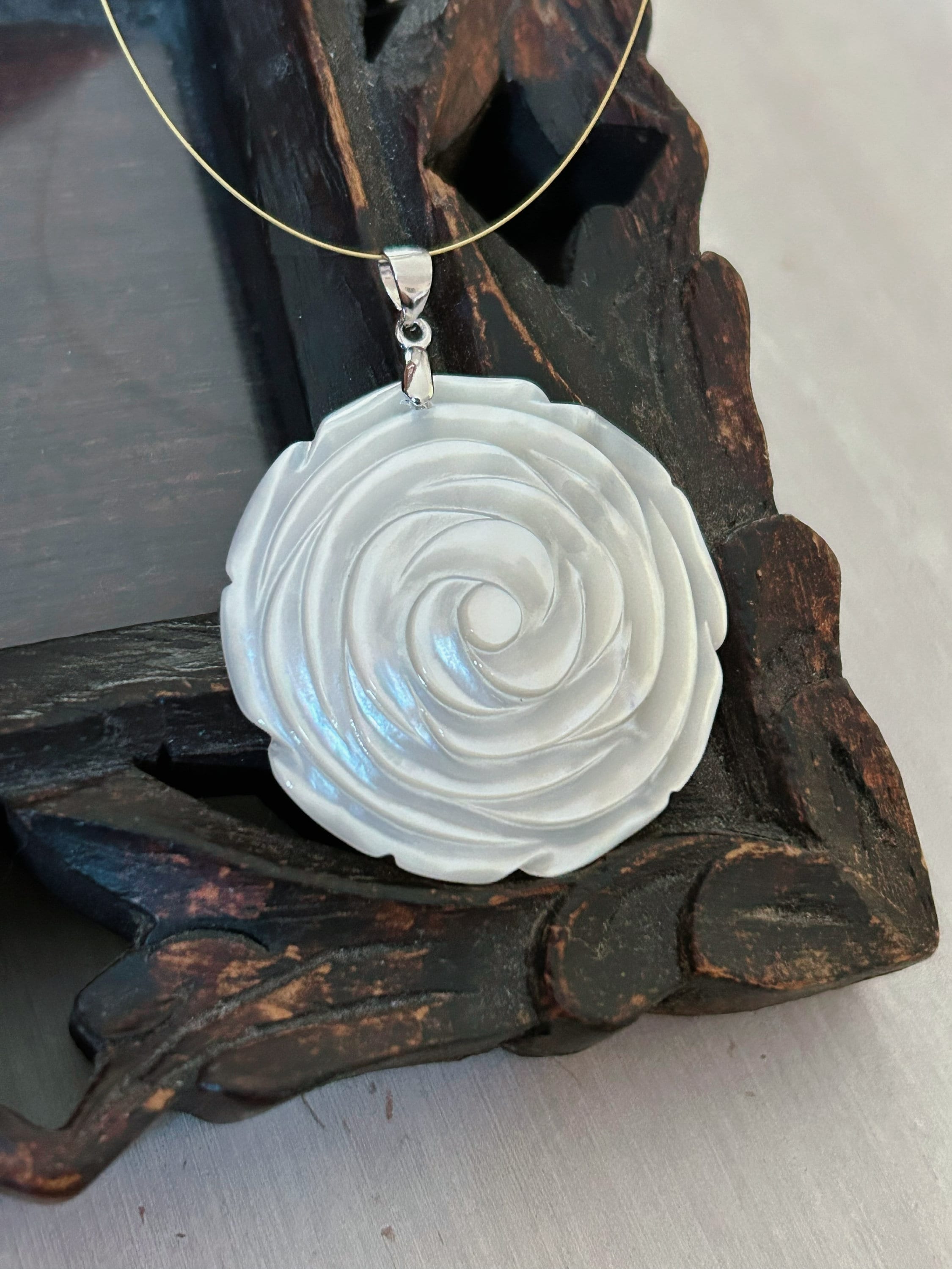 Carved mother of pearl pendant sale