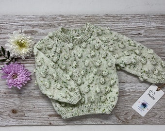 Hand knitted baby popcorn / bobble sweater, 0-3 months neutral green speckled gender jumper