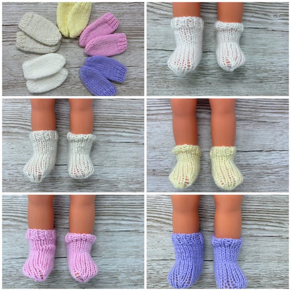 Hand knitted dolls socks in assorted plain colours, choice of 2 sizes
