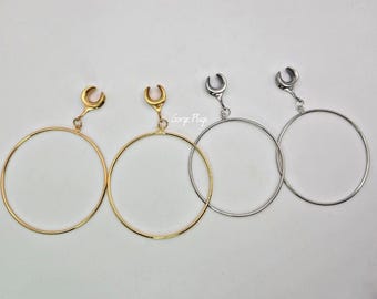 May include: Three pairs of hoop earrings with a crescent moon charm. The earrings are available in gold, silver, and rose gold.