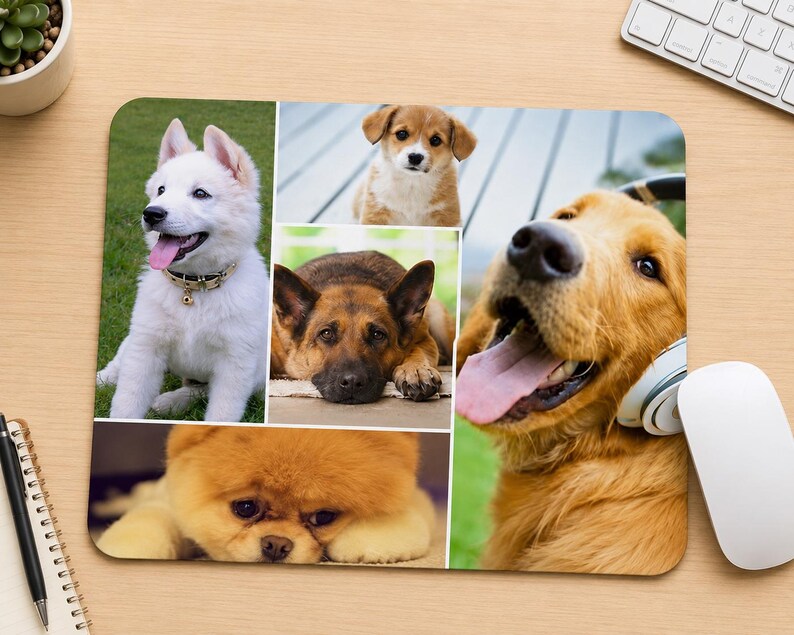 May include: A rectangular mouse pad featuring a photo collage of five dogs. The images include a white puppy, a small brown puppy, a German Shepherd, a fluffy orange dog, and a golden dog wearing white headphones with its tongue hanging out.