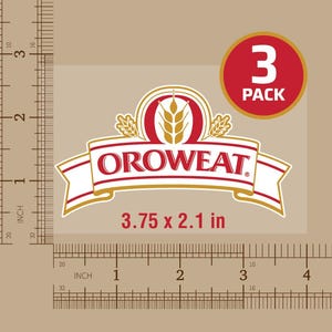 May include: A rectangular Oroweat brand sticker featuring a red and white banner design with a central wheat stalk graphic. The sticker measures 3.75 inches by 2.1 inches and is sold as a 3 pack. The text OROWEAT is printed in red on the white banner.