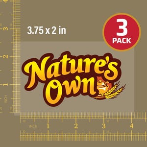 May include: A rectangular sticker featuring the text Nature's Own in yellow with a dark brown outline. To the right of the text is a small illustration of a pot and wheat stalks. A red circle in the corner reads 3 PACK. The sticker measures 3.75 x 2 inches.