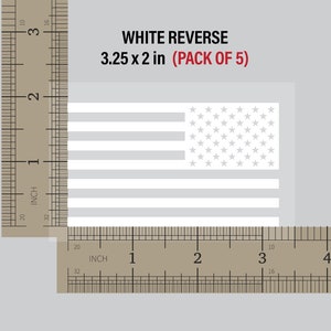 May include: A pack of five white reverse American flag decals, measuring 3.25 inches by 2 inches. The decals are shown next to a ruler for size reference.