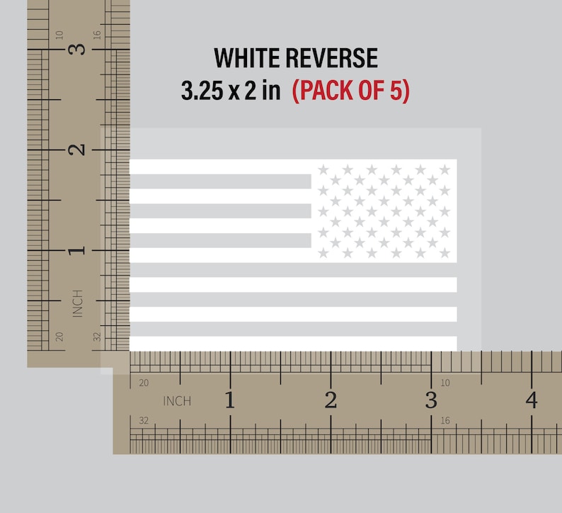 May include: A pack of five white reverse American flag decals, measuring 3.25 inches by 2 inches. The decals are shown next to a ruler for size reference.
