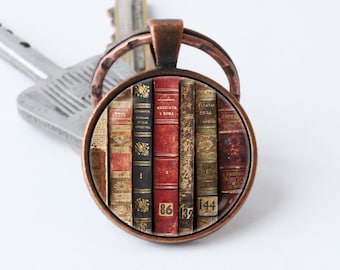 Boeken sleutelhanger boek sleutelhanger bibliothecaris sleutelhanger boeken sieraden oude boeken hanger cadeau voor schrijver boek minnaar sleutelhanger bibliofielen boekenwurmen