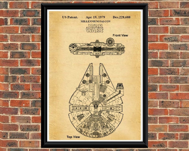 May include: A vintage-style illustration of the Millennium Falcon spaceship from Star Wars. The image shows a top and front view of the ship, with the text "US Patent. Apr. 19, 1979 Des. 228,688 MILLENNIUM FALCON STAR WARS Front View Top View" printed on the page.