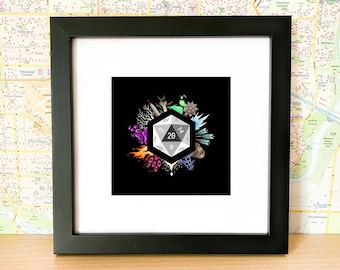 May include: A framed print of a 20-sided die with a black background and colorful elements surrounding it. The die is white with black numbers and the numbers 14, 20, and 8 are visible.