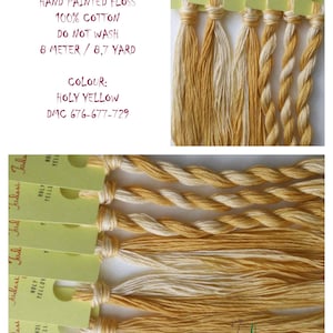 May include: Hand-painted embroidery floss in the color "Holy Yellow" with a DMC color code of 676-677-729. The floss is 100% cotton and comes in an 8-meter/8.7-yard skein.