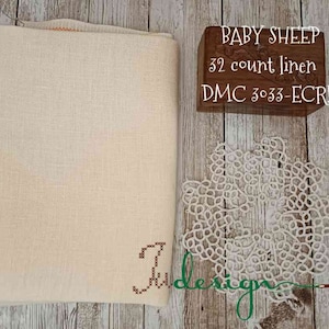 May include: A piece of off-white linen fabric with a small cross-stitch design in the bottom right corner. The fabric is labeled "BABY SHEEP 32 count linen DMC 3033-ECRU".
