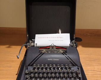 1946 Smith Corona Sterling portable manual typewriter with carrying case