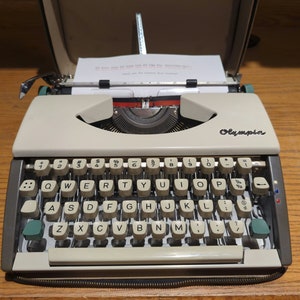 Cursive 1961 Olympia SF Ultra Portable Typewriter With Script cursive ...