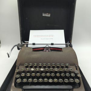 1948 Smith Corona Sterling portable manual typewriter with carrying case