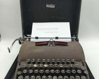 1948 Smith Corona Sterling portable manual typewriter with carrying case