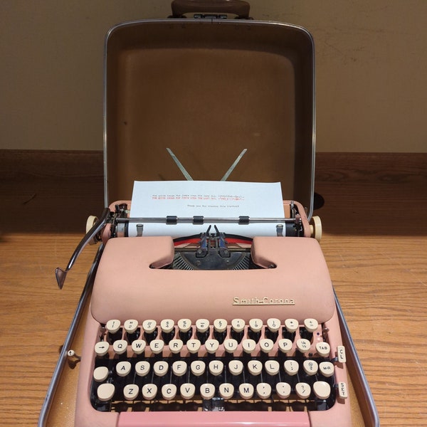 1957 Pink Smith Corona Silent-Super manual portable typewriter with case