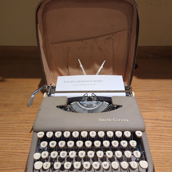 1959 Smith Corona Skyriter ultra portable manual typewriter with carrying case