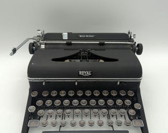 Display only - 1940 Black Royal Quiet Deluxe portable manual typewriter