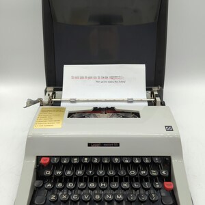 Cursive! 1974 White Montgomery Wards Escort 55 portable manual typewriter with script typeface - Olivetti clone!