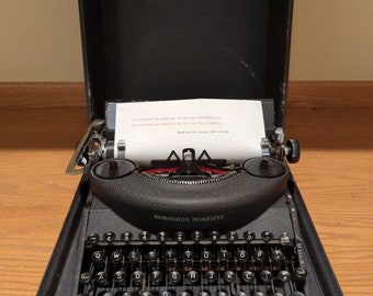 1948 Remington Noiseless 7 portable manual typewriter with case