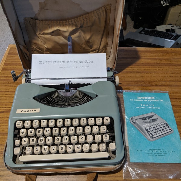 1950's Grayish Teal Smith Corona Empire ultraportable typewriter with case and instruction manual