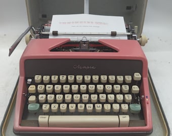 Cursive! 1963 Pink Olympia SM7 portable typewriter with carrying case - script typeface